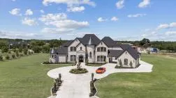 Aerial perspective of the $4.15 million estate at 1850 New Castle Court in Lucas, Texas