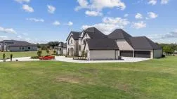 Aerial view of the grounds at 1850 New Castle Court in Lucas, Texas